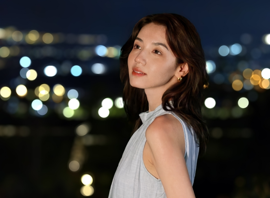 Portrait against night lights