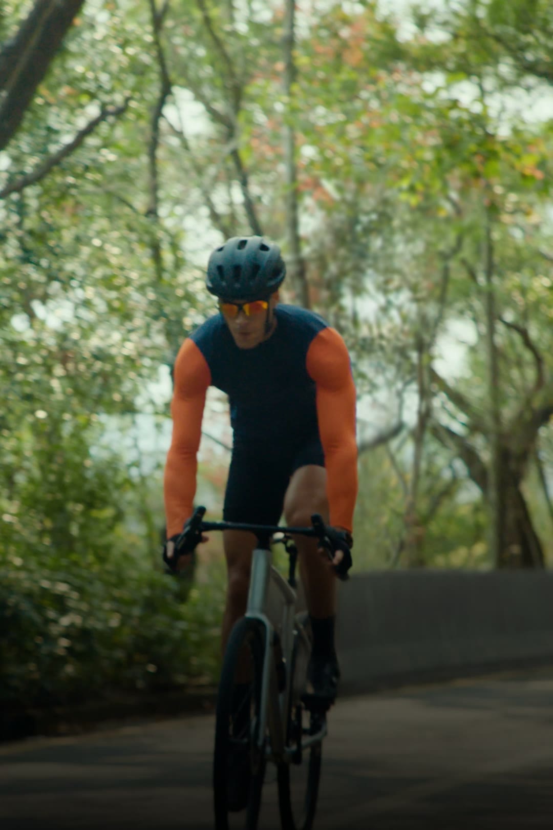 A cyclist on a forest road