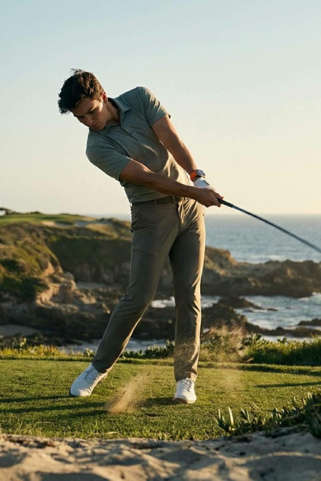 A man playing golf